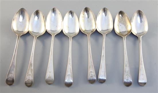 A set of eight George III silver Old English pattern dessert spoons, engraved with the Crewe crest, 8.2oz
